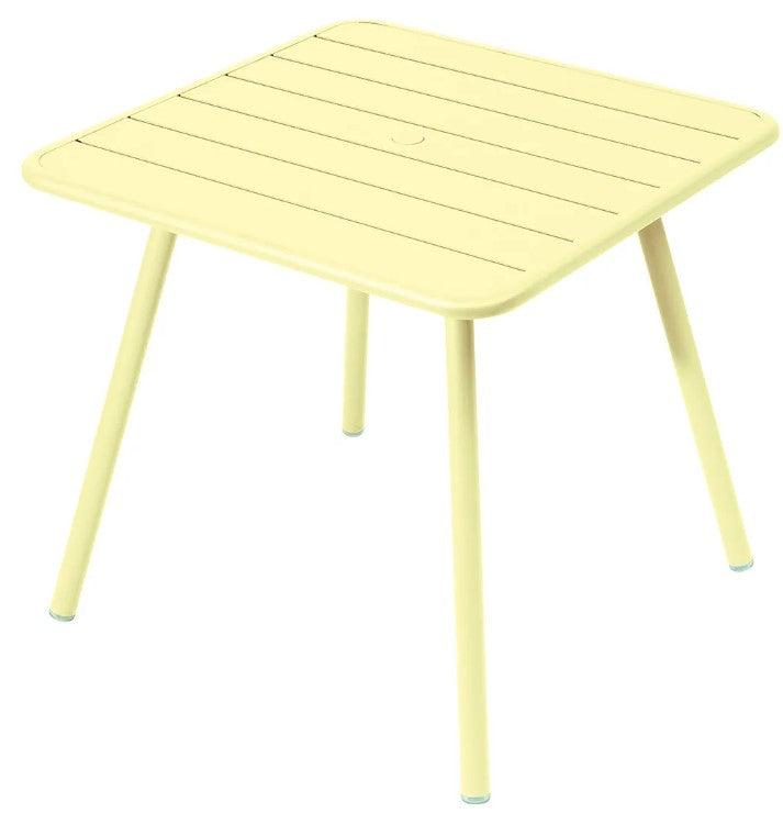 Load image into Gallery viewer, Fermob Luxembourg 4-leg garden table in lemon yellow metal with 80x80 cm aluminum surface, outdoor furniture for patio or garden.