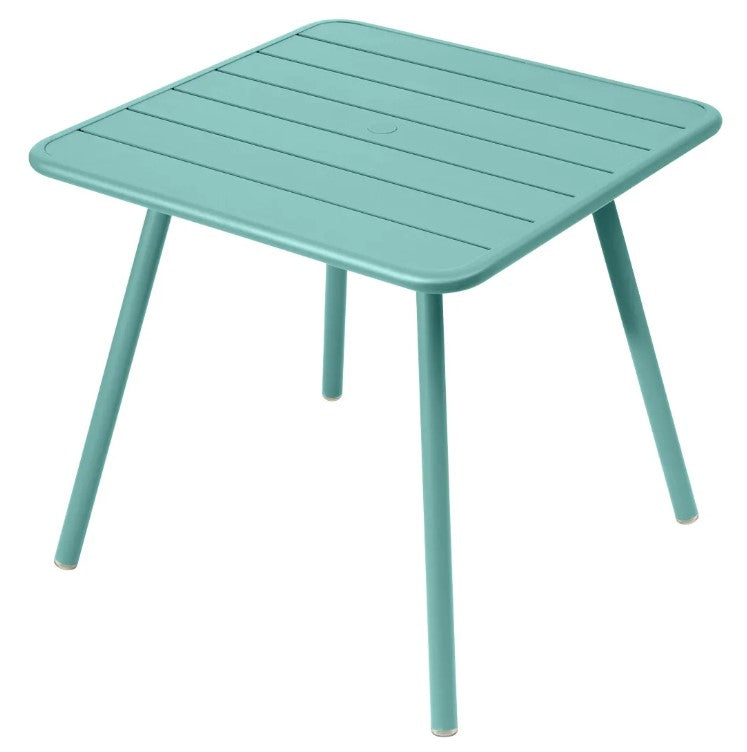 Load image into Gallery viewer, Fermob Luxembourg 4-leg garden table, 80x80 cm, made of metal with mint aluminum finish, suitable for outdoor patio.