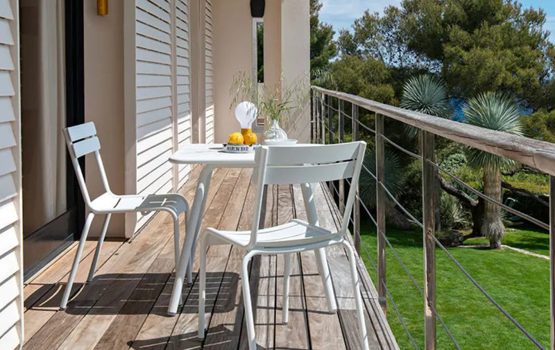 Load image into Gallery viewer, Fermob Luxembourg 4-leg garden table in white metal with 80x80 cm aluminum surface, outdoor patio furniture.