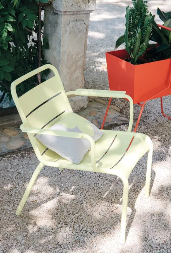 Load image into Gallery viewer, Fermob Luxembourg garden armchair lounge with curved armrests and woven-style seating, suitable for outdoor patio relaxation.