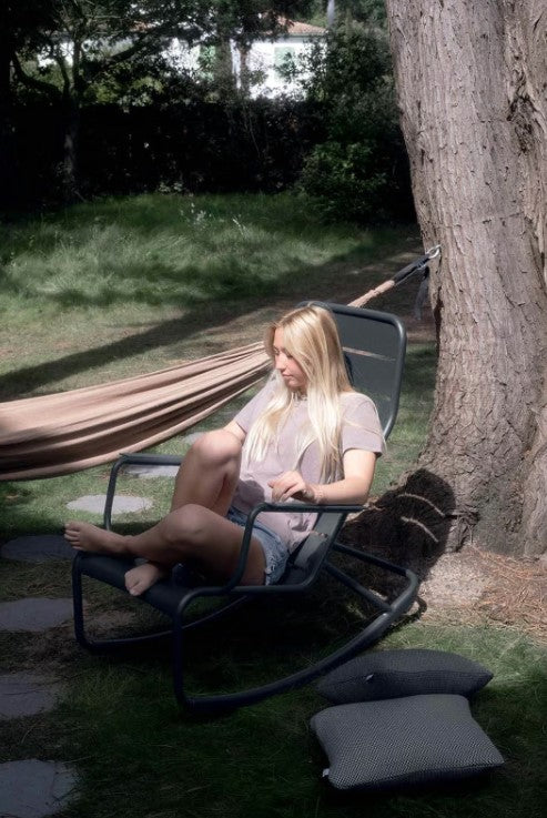 Load image into Gallery viewer, Dark grey Fermob Luxembourg outdoor rocking chair with a sleek metal frame and curved design for comfortable outdoor seating.