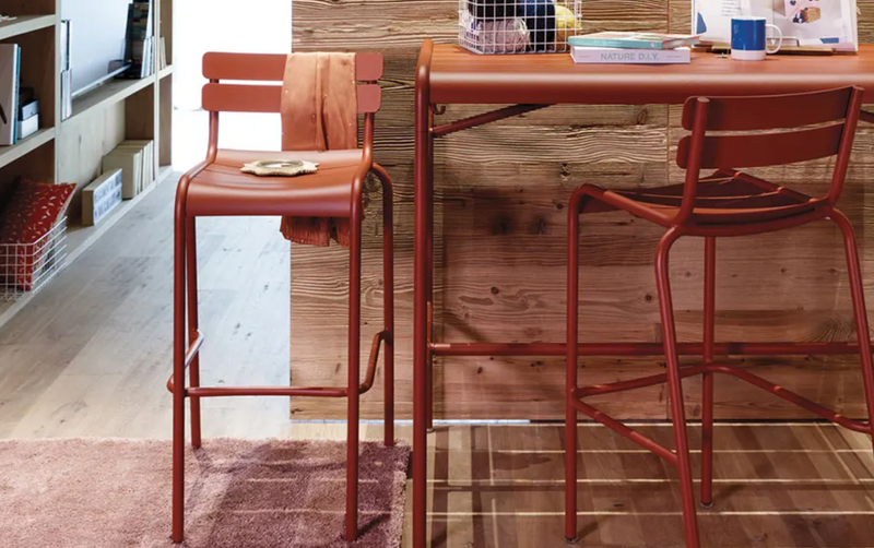 Load image into Gallery viewer, Red Fermob Luxembourg bar armchair with metal frame and armrests, suitable for pub or bar seating.