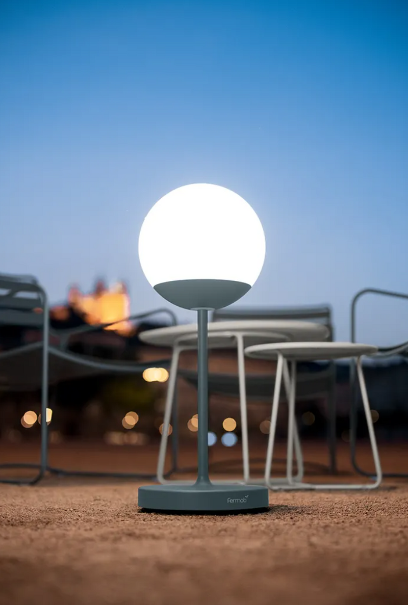 Load image into Gallery viewer, Fermob MOOON! wireless table lamp, 63 cm tall, with a modern moon-shaped design in a bright finish.