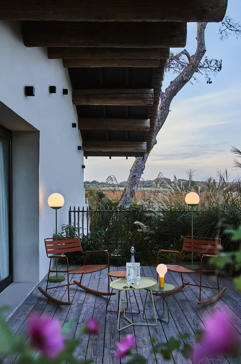 Load image into Gallery viewer, Fermob Moon! wireless floor lamp, 134 cm tall, with a sleek modern design and a glowing moon-like appearance.