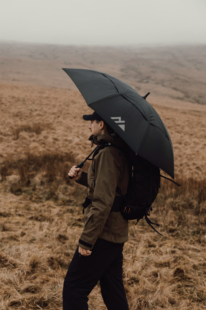 Load image into Gallery viewer, Nordic Drift 27-inch AWARE™ RPET storm umbrella with UPF 50+ sun protection, featuring a sturdy frame and stylish design.