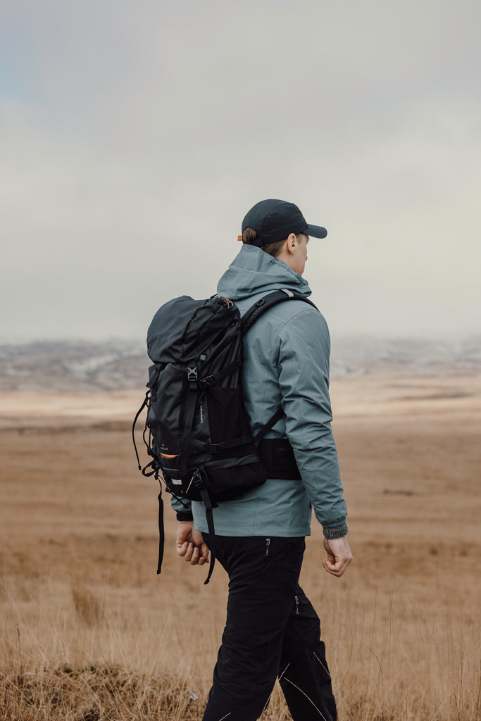 Load image into Gallery viewer, Nordic Drift Drift Trail RCS 33L backpack showing black fabric with multiple compartments and adjustable shoulder straps.
