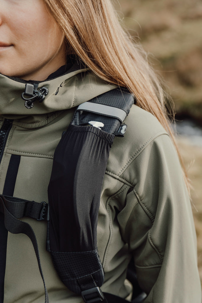 Load image into Gallery viewer, Nordic Drift Trail RCS 33L backpack showing front view with multiple compartments and adjustable straps on durable black fabric.