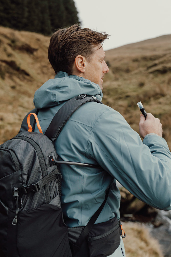 Load image into Gallery viewer, Nordic Drift Trail RCS 24L backpack with multiple compartments, black durable bag for travel and daily use.