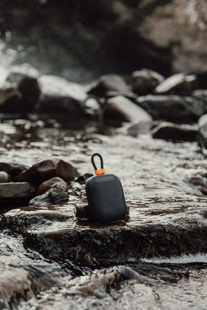 Load image into Gallery viewer, Nordic Drift Titan 5W IP67 water and dustproof audio speaker showing rugged black design with control buttons.