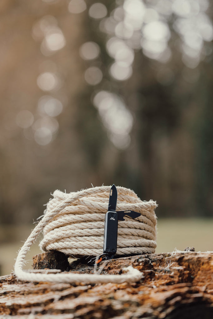Load image into Gallery viewer, Nordic Drift Adventure keychain tool with compact multi-tool design, featuring a keyring attachment and various utility functions.