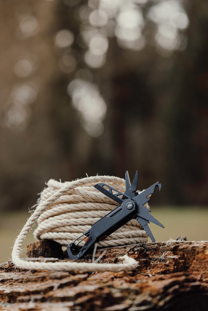 Load image into Gallery viewer, Nordic Drift Adventure Multitool with multiple functions, compact design, and durable construction for outdoor and DIY use.