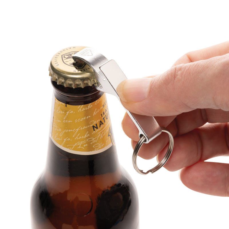 Load image into Gallery viewer, XD Collection RCS recycled aluminum bottle and can opener attached to a lanyard, showcasing eco-friendly design and durable construction.