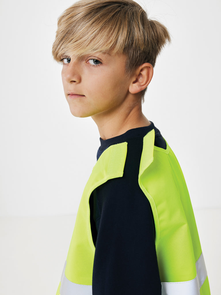 Load image into Gallery viewer, High-visibility safety vest for kids, made from recycled PET, by XD Collection, designed for children aged 7-12 years.