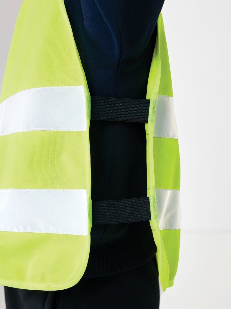 Load image into Gallery viewer, High-visibility safety vest for children aged 7-12, made from recycled PET by XD Collection, with bright reflective panels.