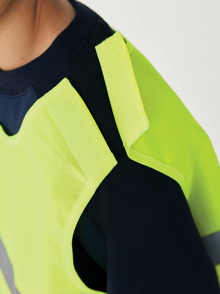 Load image into Gallery viewer, High-visibility safety vest for children, GRS recycled PET, designed for ages 7-12, by XD Collection, with reflective strips.