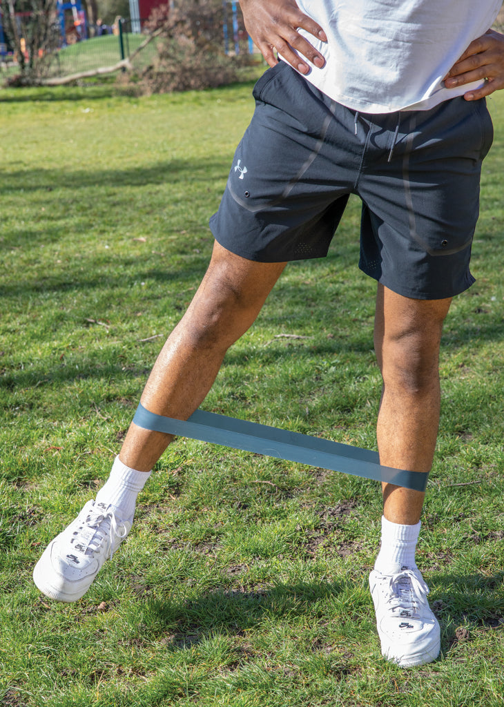 Load image into Gallery viewer, Set of four elastic fitness bands from XD Collection in a pouch, ideal for resistance training and healthy living workouts.