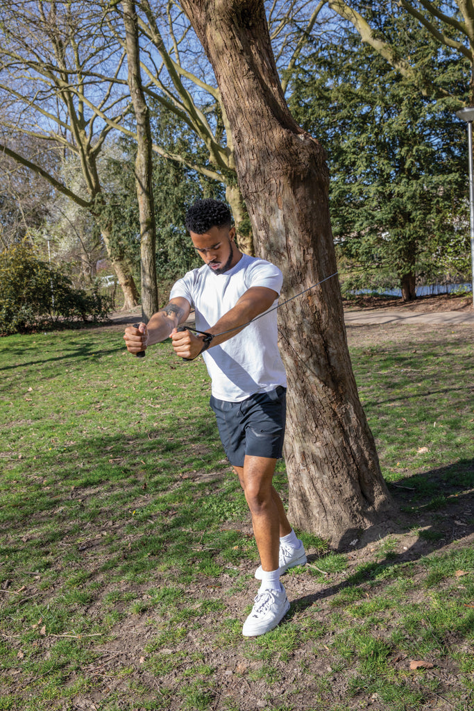 Load image into Gallery viewer, Heavy resistance fitness tube in pouch from XD Collection, ideal for strength training and workout exercises.