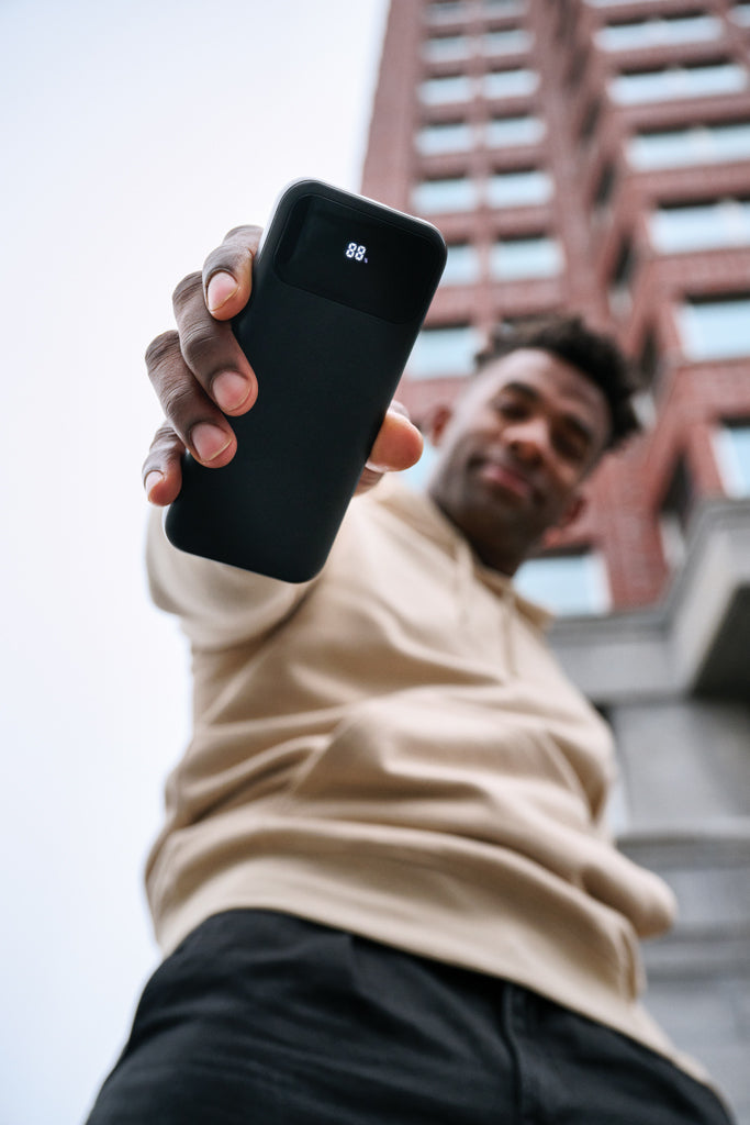 Load image into Gallery viewer, XD Collection Turbopack RCS plastic powerbank with 10,000mAh capacity and integrated cables for phone and tablet charging.