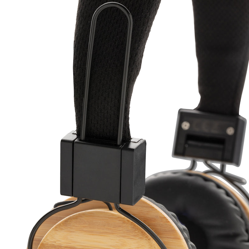 Load image into Gallery viewer, Bamboo wireless headphone from XD Collection, sleek audio device with bamboo finish and over-ear design.