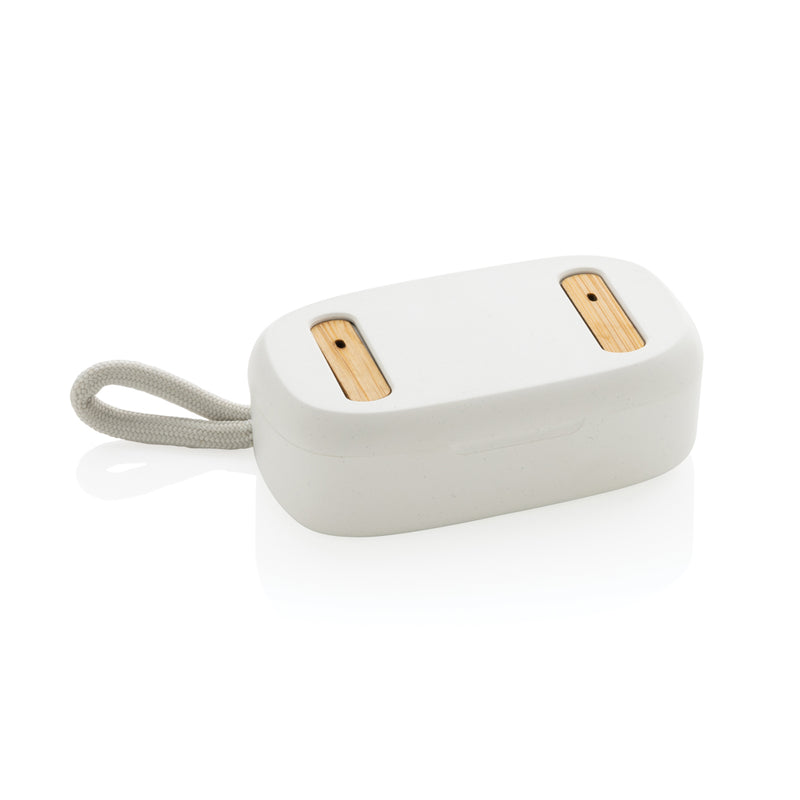 Load image into Gallery viewer, XD Collection RCS recycled plastic and bamboo TWS earbuds resting on a white surface, showcasing eco-friendly design and compact audio technology.