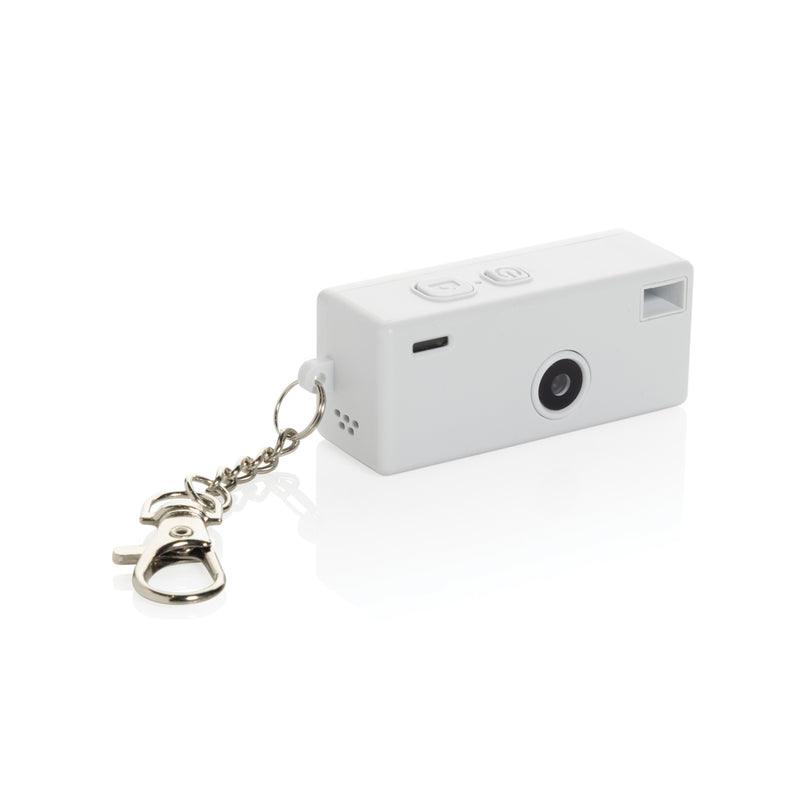 Load image into Gallery viewer, XD Xclusive Cliq it RCS recycled keychain camera attached to a phone, showcasing compact phone and tablet accessory with eco-friendly design.