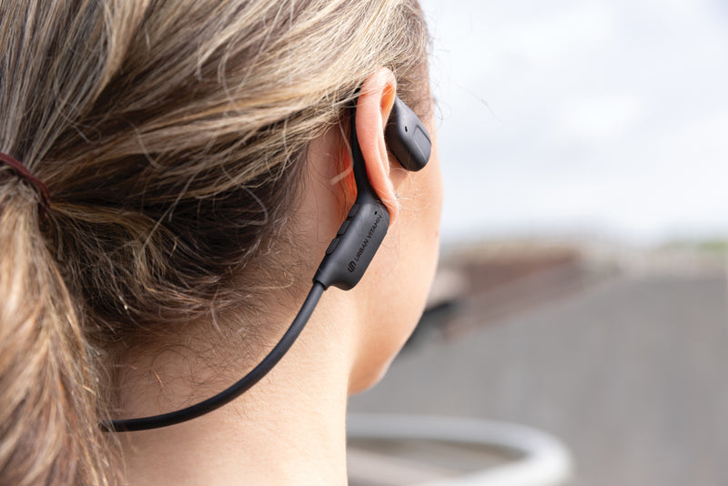 Load image into Gallery viewer, Urban Vitamin RCS plastic air conductive headphones with sleek design and comfortable ear cups for immersive audio experience.