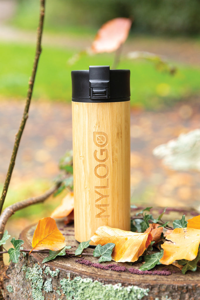 Load image into Gallery viewer, XD Xclusive Bogota vacuum bamboo coffee mug, eco-friendly drinkware with bamboo exterior and secure lid, ideal for hot beverages.