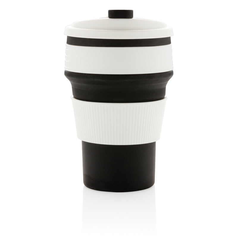 Load image into Gallery viewer, Foldable silicone drinkware cup by XD Collection, showing a flexible, portable silicone cup folded and expanded for drinking.