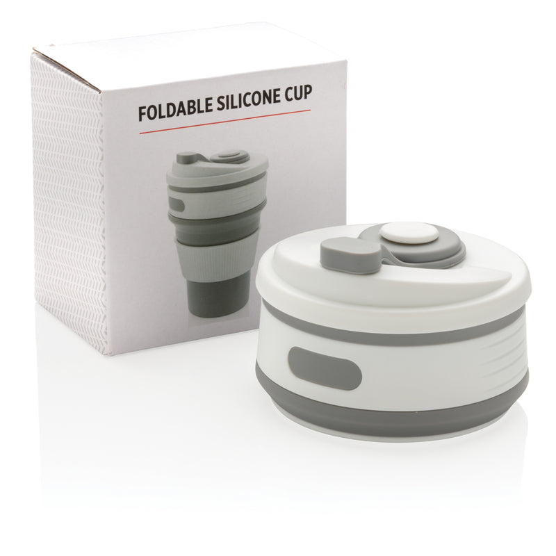 Load image into Gallery viewer, Foldable silicone drinkware cup from XD Collection, showing its flexible, portable design and vibrant color.