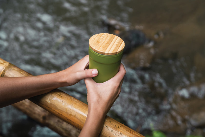 Load image into Gallery viewer, Recycled PP mug with bamboo lid from XD Collection, eco-friendly drinkware perfect for beverages.