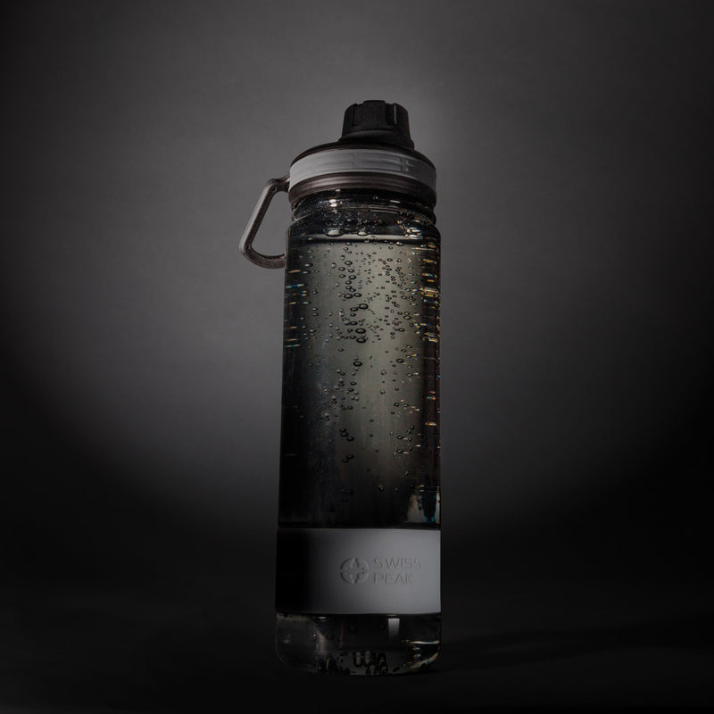 Load image into Gallery viewer, Swiss Peak Tritan drinkware bottle with a sleek design, featuring a transparent body and secure lid for everyday hydration.