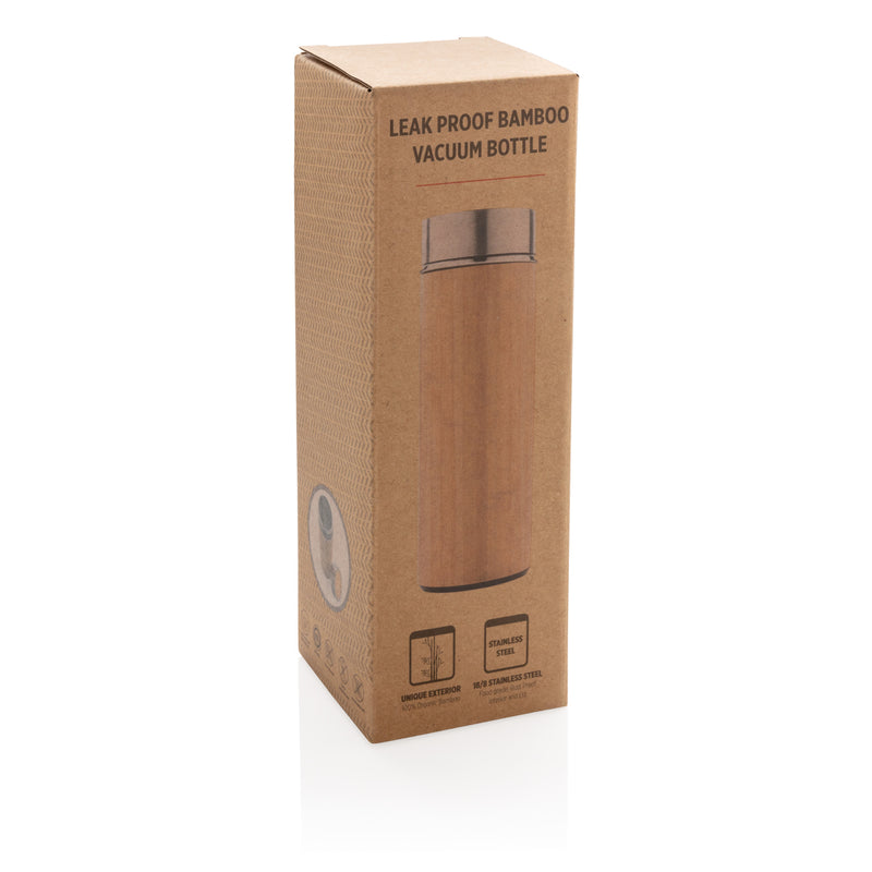 Load image into Gallery viewer, Leak-proof bamboo vacuum bottle from XD Collection, showcasing eco-friendly drinkware with a sleek bamboo exterior and secure lid.