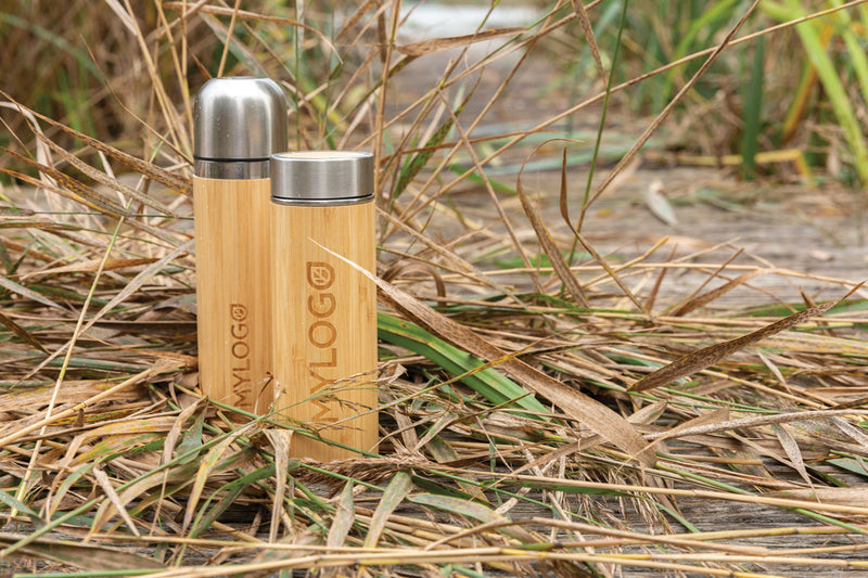 Load image into Gallery viewer, Leak-proof bamboo vacuum bottle by XD Collection, sturdy drinkware with insulated design and natural bamboo finish.