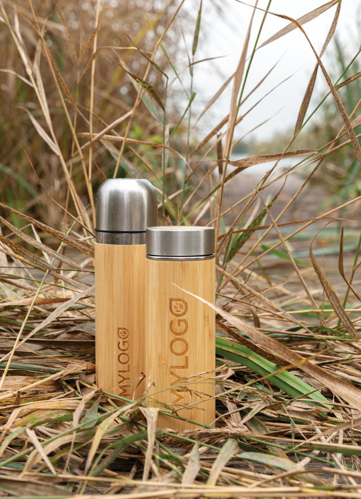 Load image into Gallery viewer, Leak-proof bamboo vacuum bottle from XD Collection, insulated drinkware with a sleek bamboo finish and secure lid.