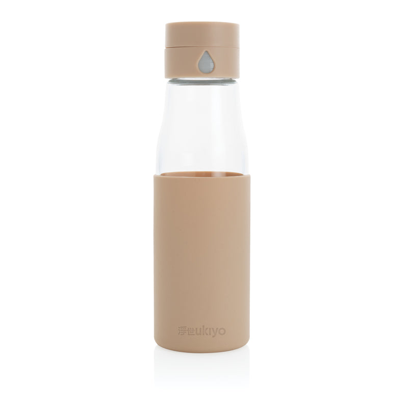 Load image into Gallery viewer, Ukiyo glass hydration tracking bottle with sleeve, clear drinkware featuring measurement markings and a protective fabric sleeve.