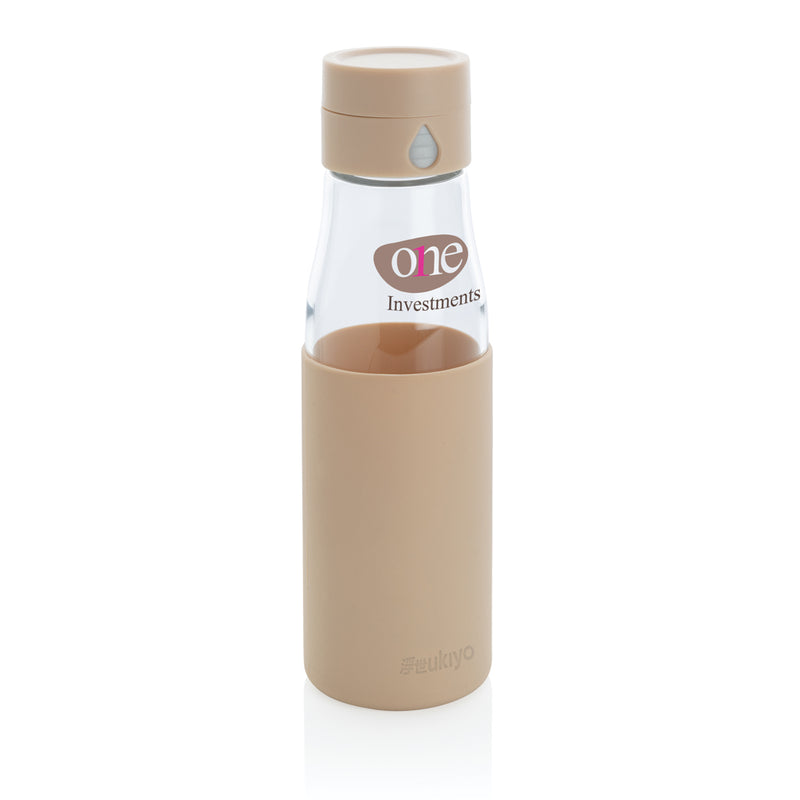 Load image into Gallery viewer, Ukiyo glass hydration tracking bottle with sleeve, clear drinkware with measurement markings and protective sleeve.