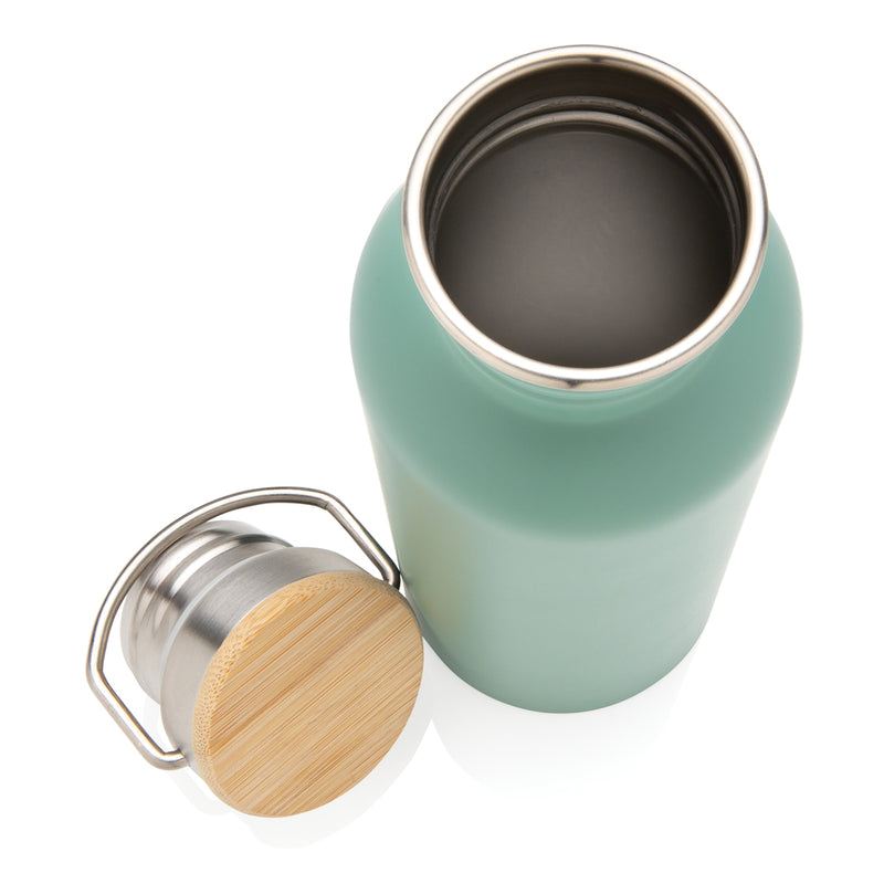 Load image into Gallery viewer, Modern stainless steel drinkware bottle with bamboo lid from XD Collection, featuring a sleek design and eco-friendly lid.