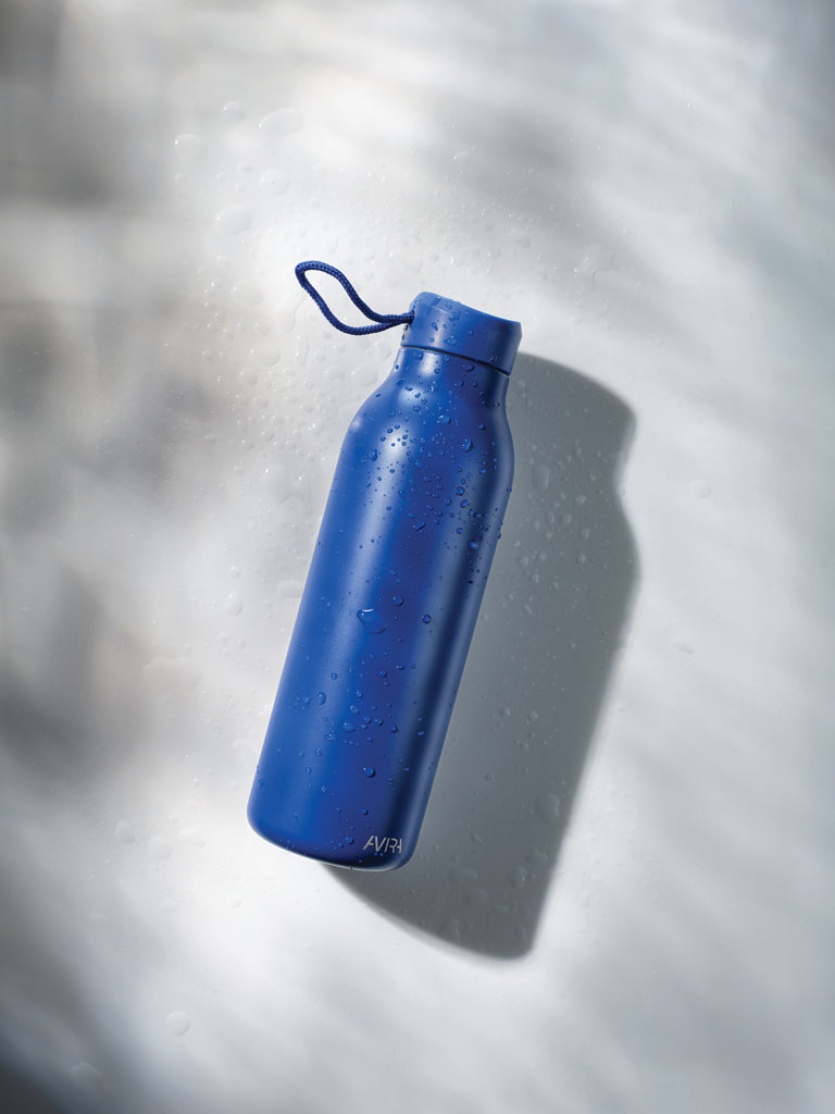 Load image into Gallery viewer, Avira Avior RCS Re-steel 500ml drinkware bottle with stainless steel body and black screw-on lid, positioned upright.