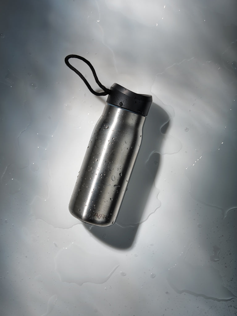 Load image into Gallery viewer, Avira Ain RCS Re-steel 150ML mini travel bottle - Custom Wood Designs