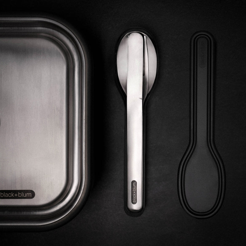Load image into Gallery viewer, Black + Blum outdoor cutlery set with stainless steel utensils and black handles, perfect for camping or picnics.