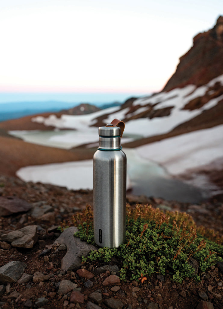 Load image into Gallery viewer, Large 750ml insulated water bottle from Black + Blum, showcasing stainless steel design with a secure screw-on lid.