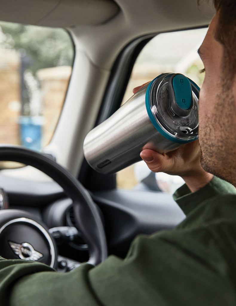 Load image into Gallery viewer, Black + Blum insulated 600ml travel tumbler in stainless steel with a black lid and sleek design for hot and cold beverages.