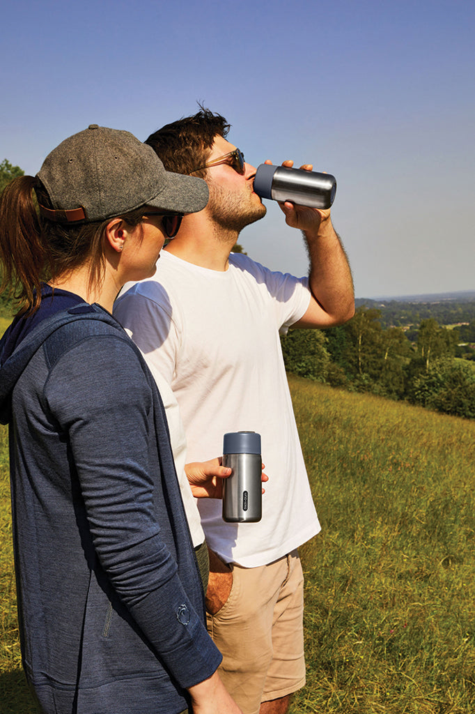 Load image into Gallery viewer, Black + Blum insulated leakproof stainless steel travel cup for hot and cold beverages, with a sleek, modern design.