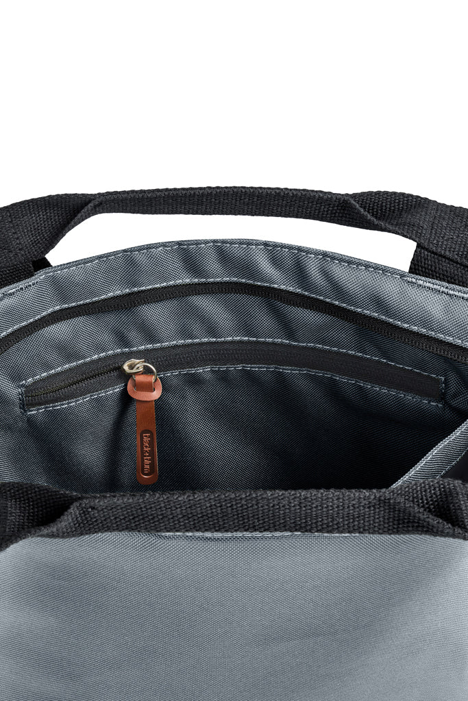 Load image into Gallery viewer, Black + Blum 16L insulated outdoor tote cooler bag with handle, featuring a sleek design and durable insulation for keeping items cold.