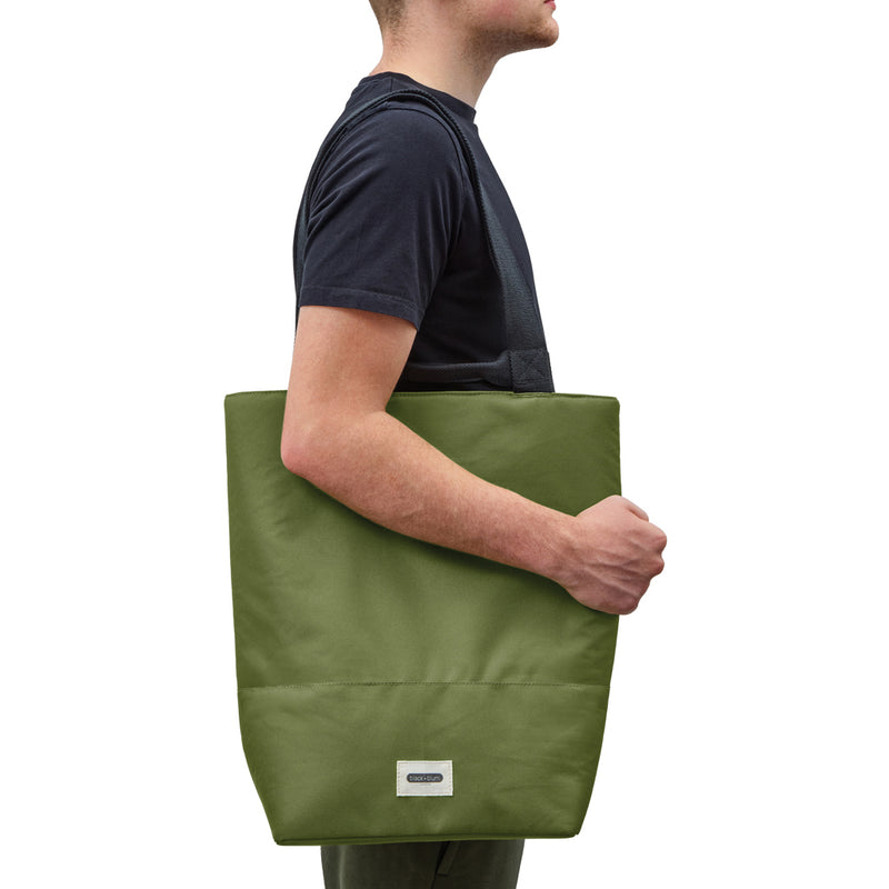 Load image into Gallery viewer, Black + Blum 16L insulated outdoor cooler tote bag with handles, showing its sleek design and insulated interior.