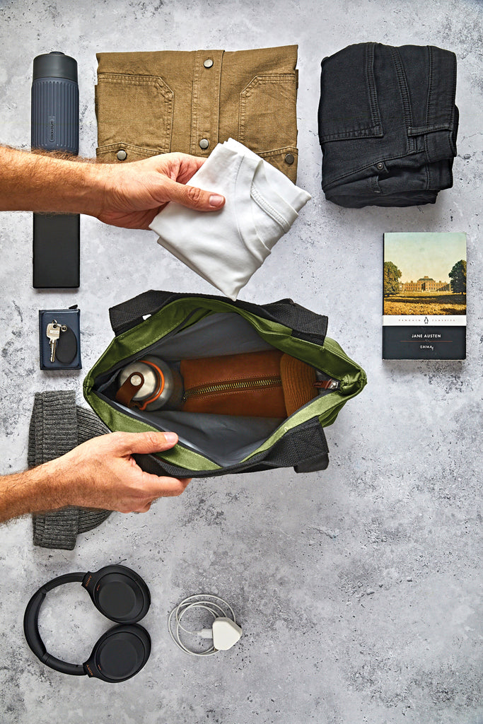 Load image into Gallery viewer, Black + Blum 16L insulated tote cooler bag for outdoor use, featuring a durable design and spacious interior for food and drinks.