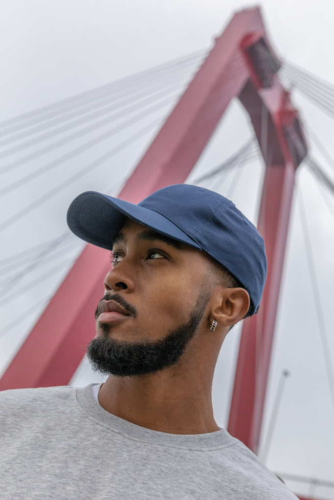Load image into Gallery viewer, Six-panel recycled cotton cap by XD Collection with AWARE™ tracer, showcasing its eco-friendly design and casual headwear style.