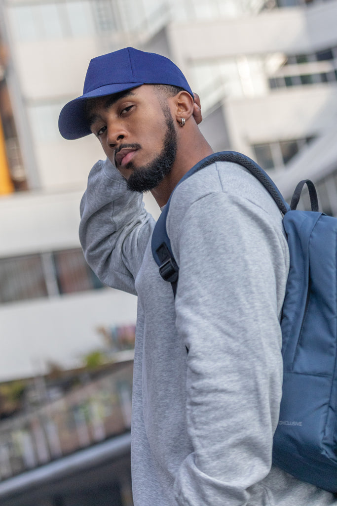 Load image into Gallery viewer, Impact 5-panel recycled cotton cap by XD Collection featuring AWARE™ tracer, showcasing its eco-friendly headwear design.