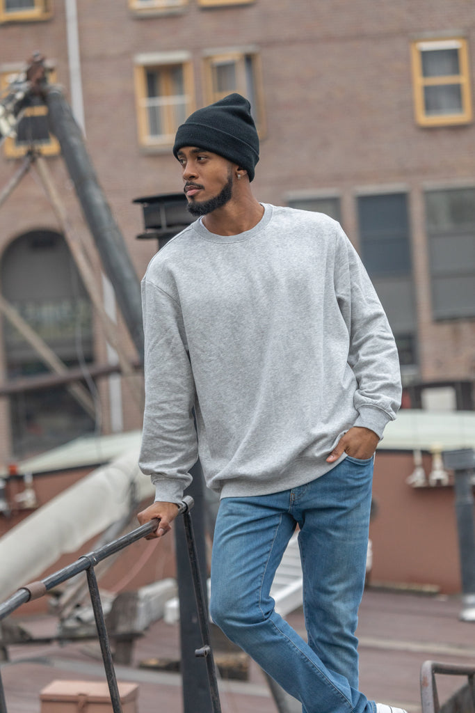 Load image into Gallery viewer, Polylana® beanie headwear from XD Collection, featuring a cozy, knitted design in neutral tones for stylish warmth.