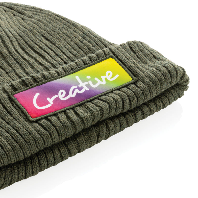 Load image into Gallery viewer, Impact AWARE™ Polylana® double knitted beanie by XD Collection, showcasing a cozy, double-layered headwear in natural tones.